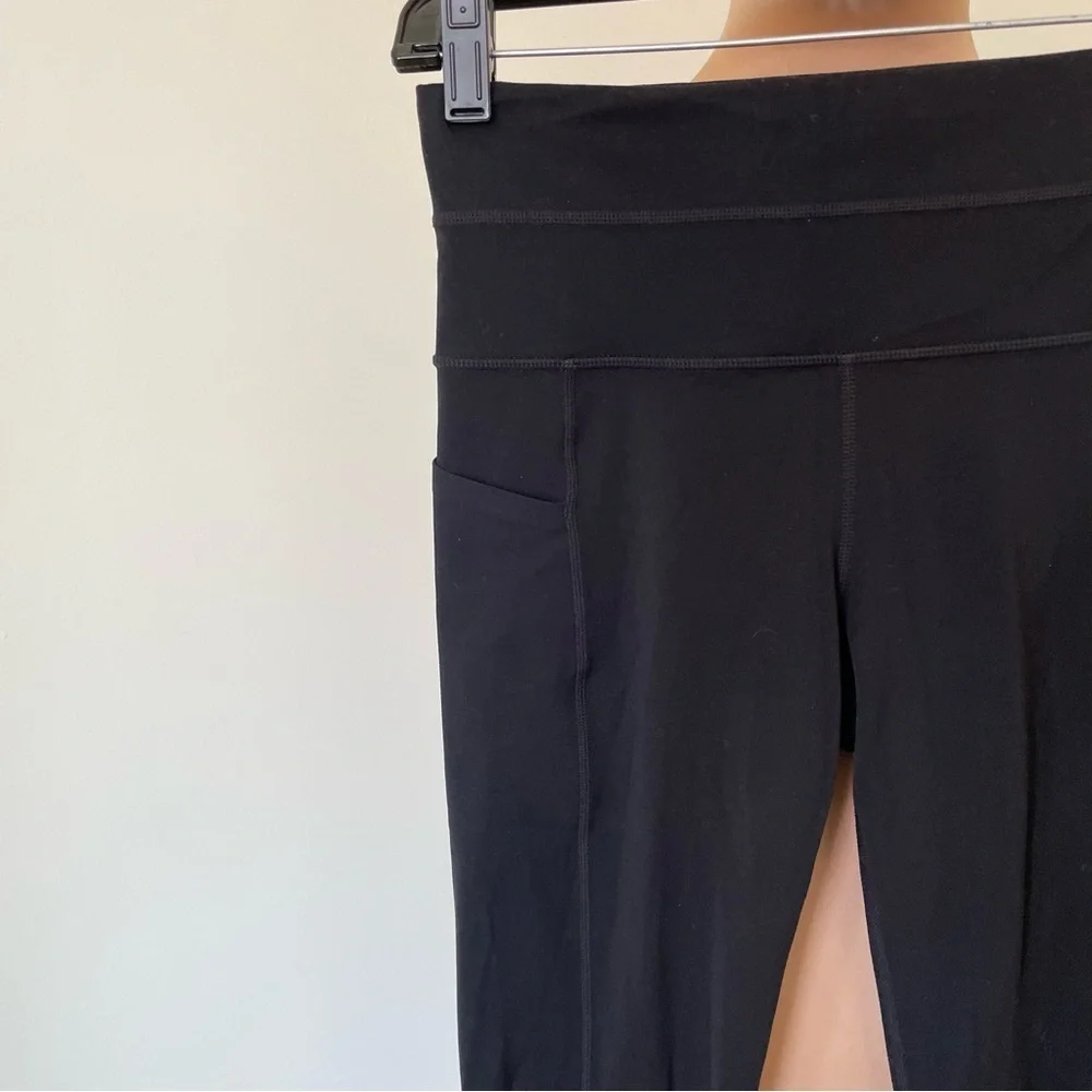 Athleta Black Niyama 7/8 Length Laser Cut Side Pockets Leggings 353777 EUC S